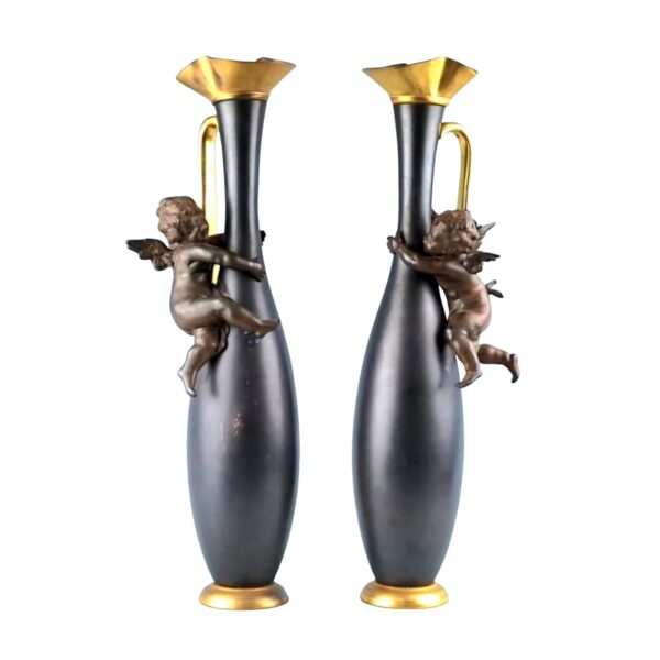 A pair of antique French gilt bronze candlesticks with pewter figures,19thC