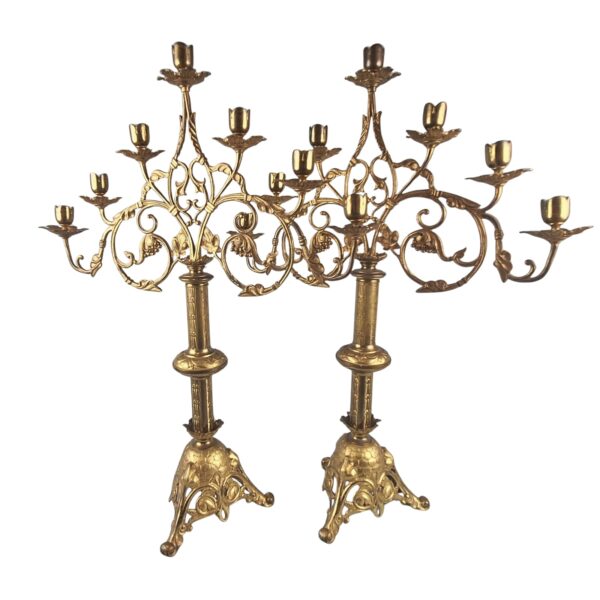A pair of antique French gilt bronze candle holders, 19thC